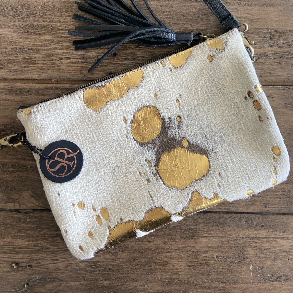 Crossbody purse with black strap